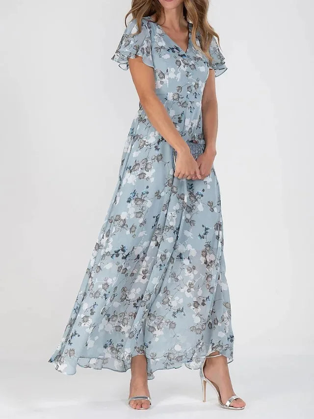 AD | Maxiklänning med volangärmar och blommigt mönster