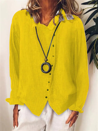 AD | Asymmetrisk blus med knäppning