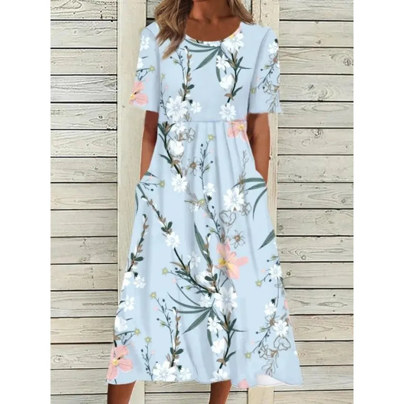 AD | Linneklänning med fickor och blommigt tryck i akvarellstil