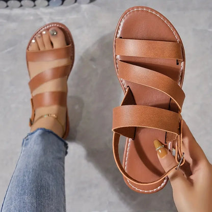 AD | Platta sandaler med öppen rygg och spänne