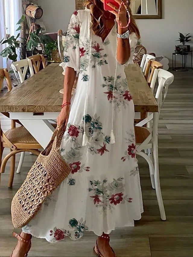 AD | Blommig maxiklänning med rosett