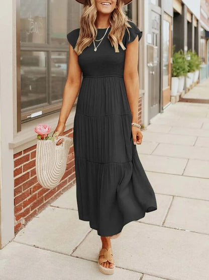 AD | Elegant sommarklänning med plissering och volanger