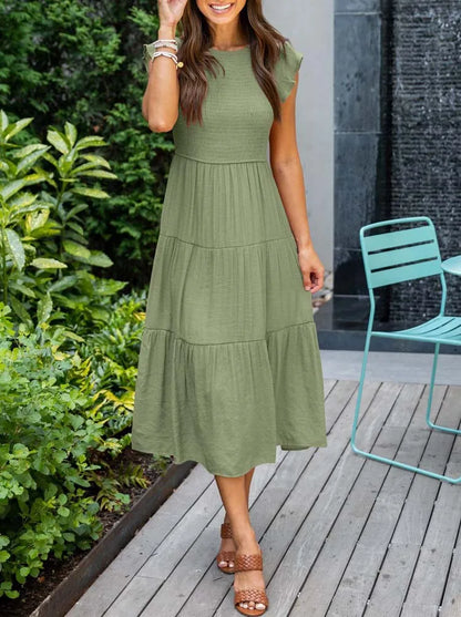 AD | Elegant sommarklänning med plissering och volanger