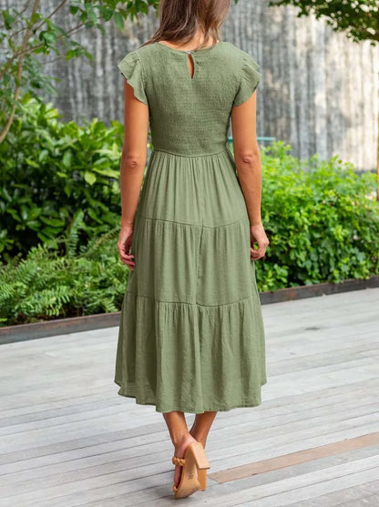 AD | Elegant sommarklänning med plissering och volanger