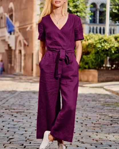 AD | Kortärmad jumpsuit med bälte