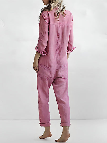 AD | Långärmad jumpsuit med knappslå