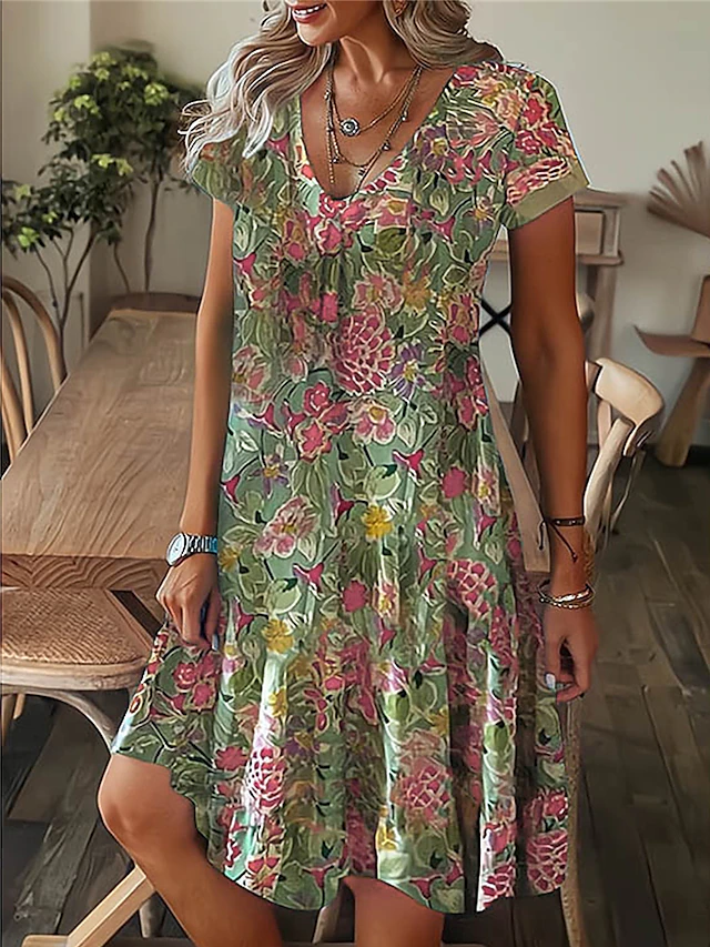 AD | Sommarklänning med fjädermönster