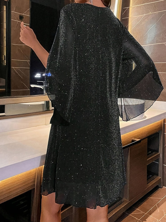 AD | Elegant glitterklänning med V-ringning och slitsade ärmar