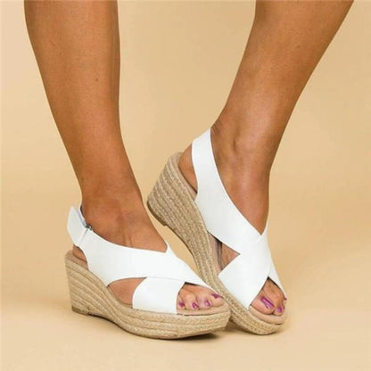 AD | Wedge-sandaler med korsade remmar
