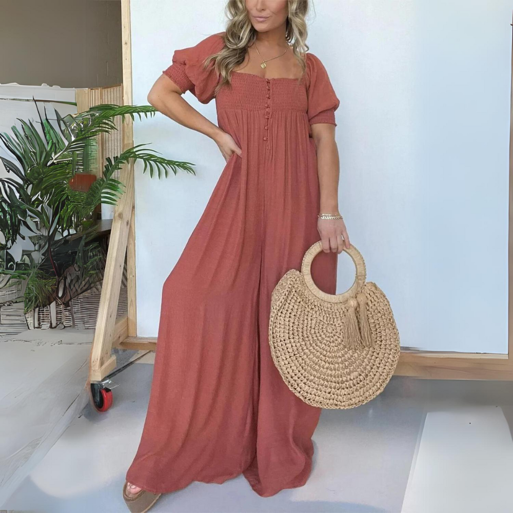 AD | Jumpsuit med fyrkantig halsringning och knappar