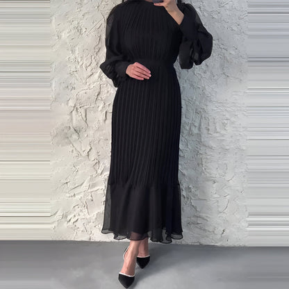 AD | Elegant och tidlös plisserad klänning