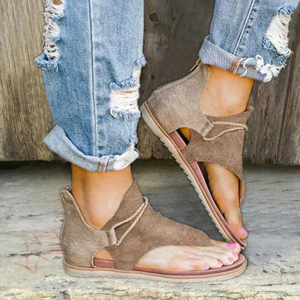 AD | | Platta ortopediska sandaler