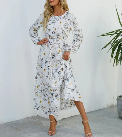 AD - Blommig klänning med fast midja