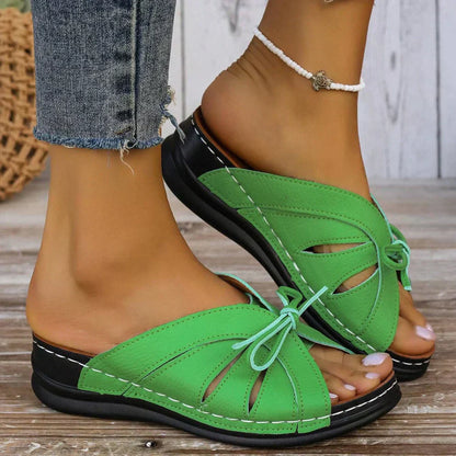 AD | | Bekväma sandaler med rosett