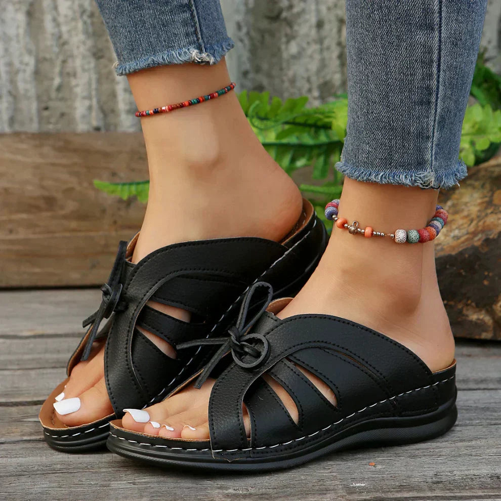 AD | | Bekväma sandaler med rosett