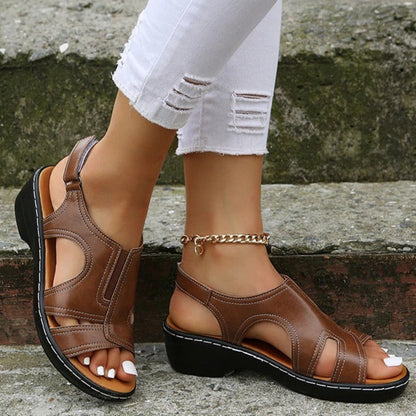 AD | | Ortopediska sandaler med kilklack
