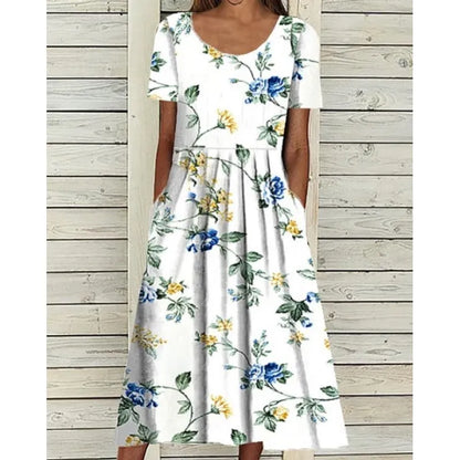 AD | Linneklänning med fickor och blommigt tryck i akvarellstil