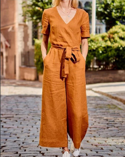 AD | Kortärmad jumpsuit med bälte