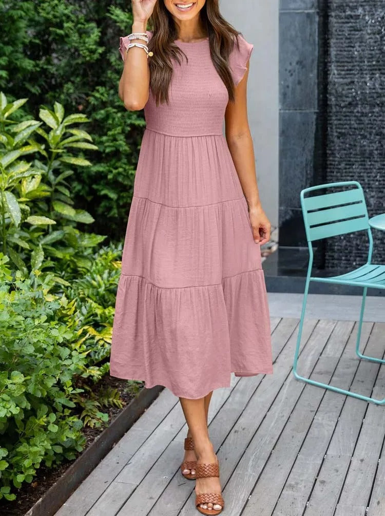 AD | Elegant sommarklänning med plissering och volanger