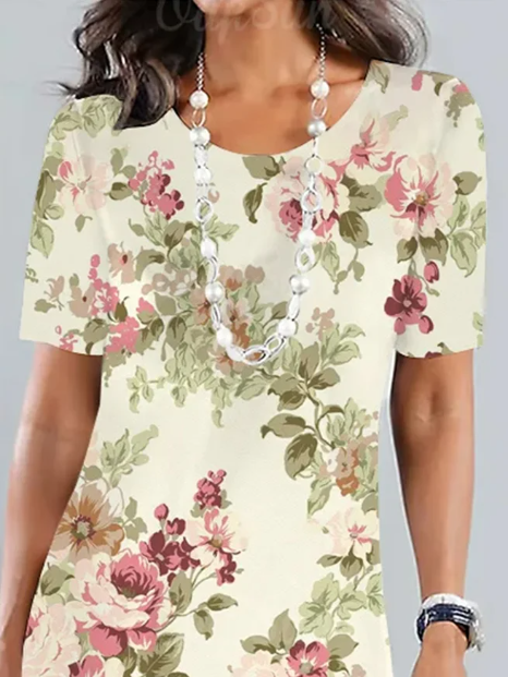 AD | Elegant midiklänning med blommigt mönster och vid rund halsringning för trädgårdsfester