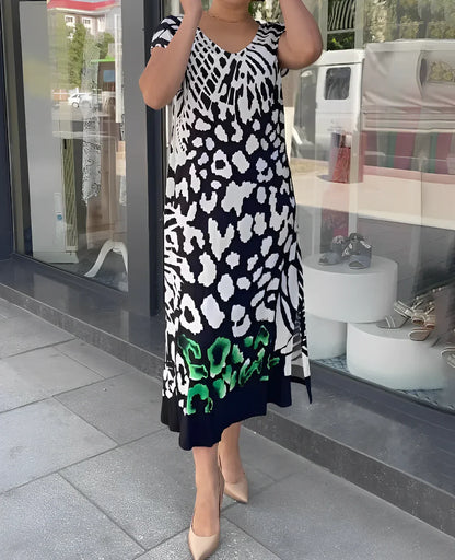 AD | Klänning i linne med kort ärm och tryck