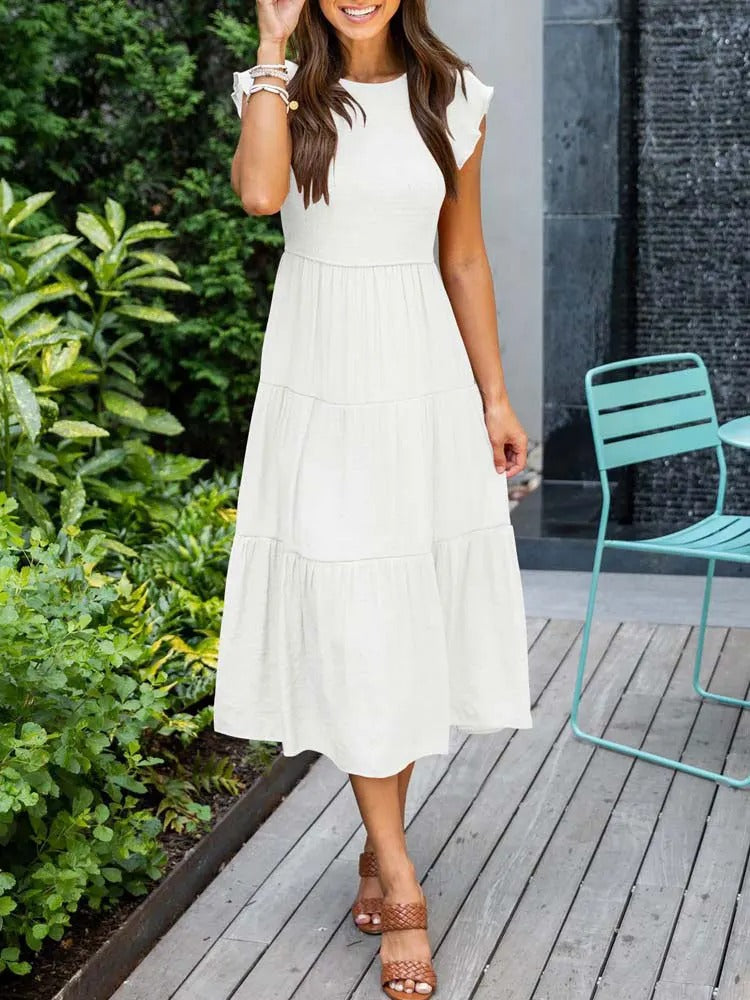 AD | Elegant sommarklänning med plissering och volanger