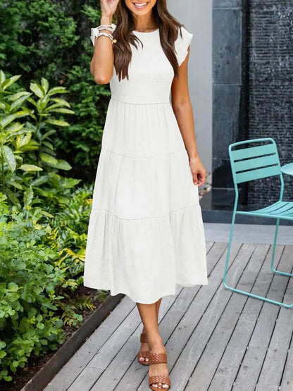 AD | Elegant sommarklänning med plissering och volanger